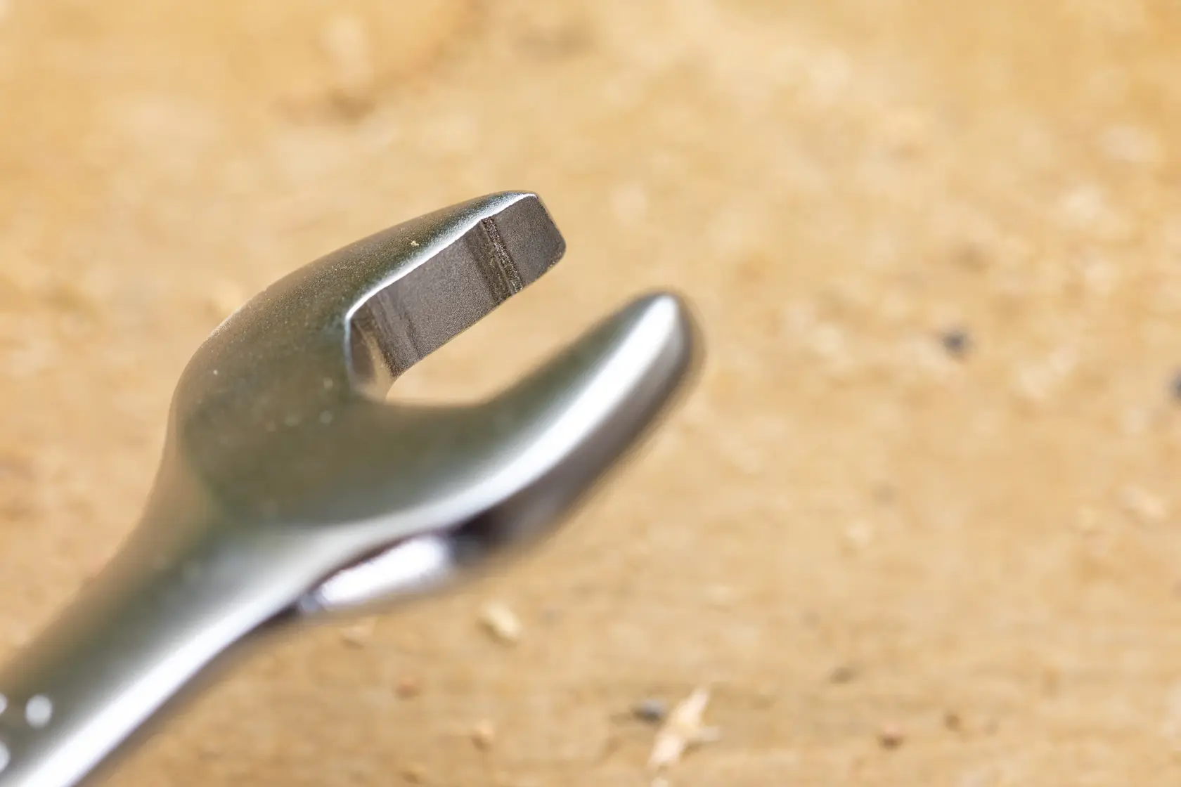 STANLEY FMMT13086-0 open-end wrench close-up on wood surface, tool photography.