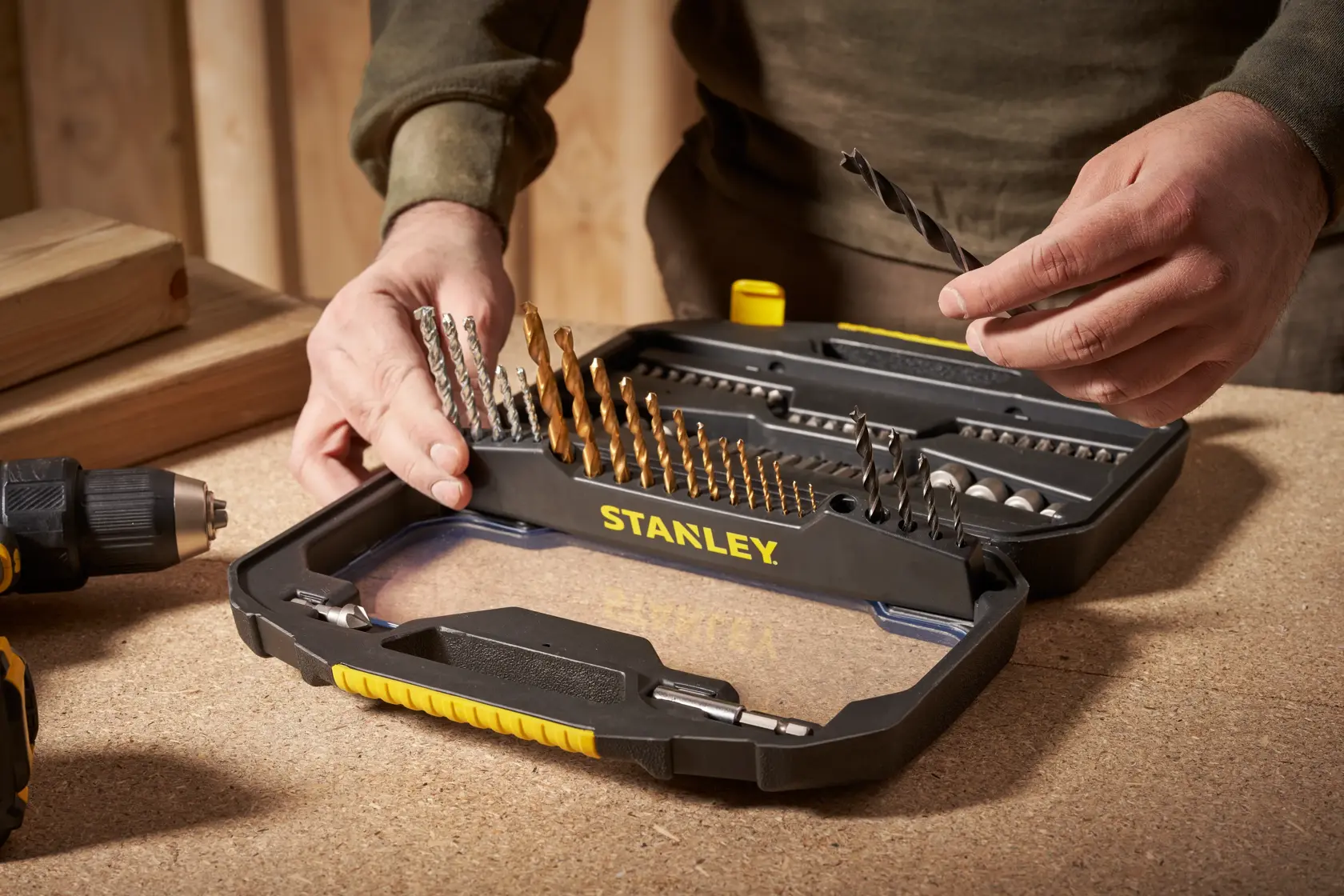 Photo of STANLEY STA7184 drill bit and accessory set in black case, tabletop angle.