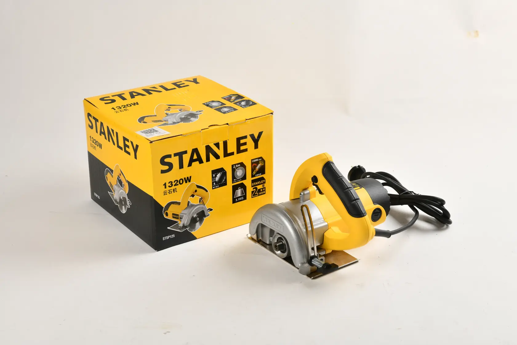 STANLEY STSP125-KR circular saw in yellow and silver with box, front angle, power cable visible.